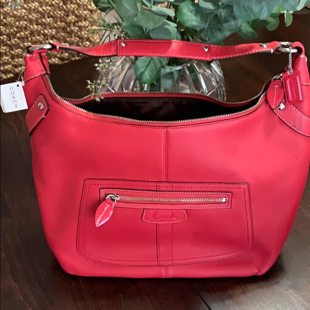 Beautiful coral coach hobo bag